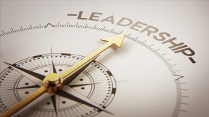 compass pointing to word leadership